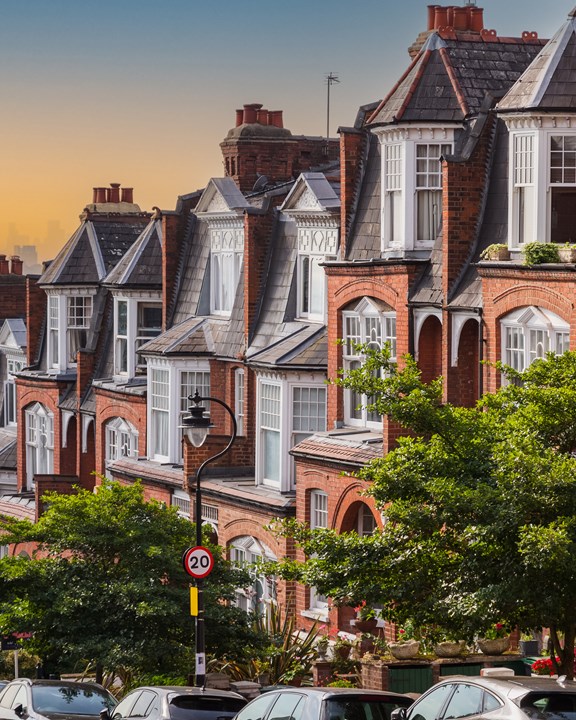 Row of English terraced houses at sunset